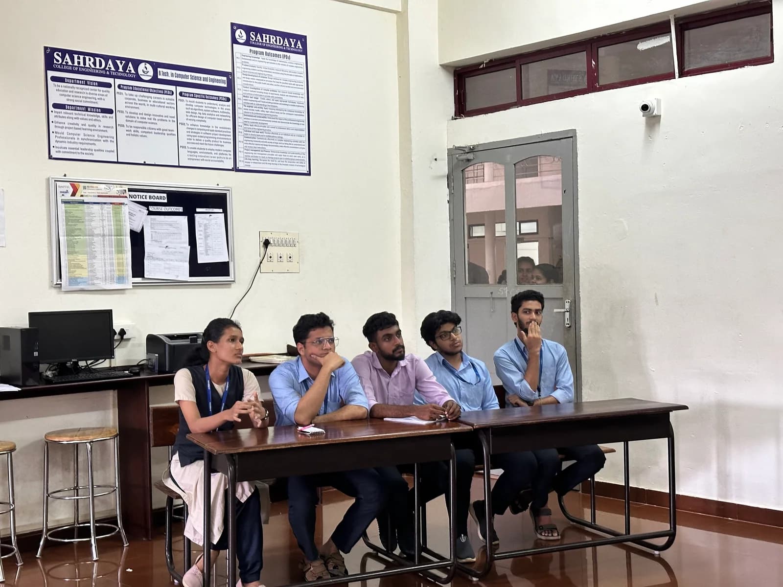 Students seated together during a debate competition
