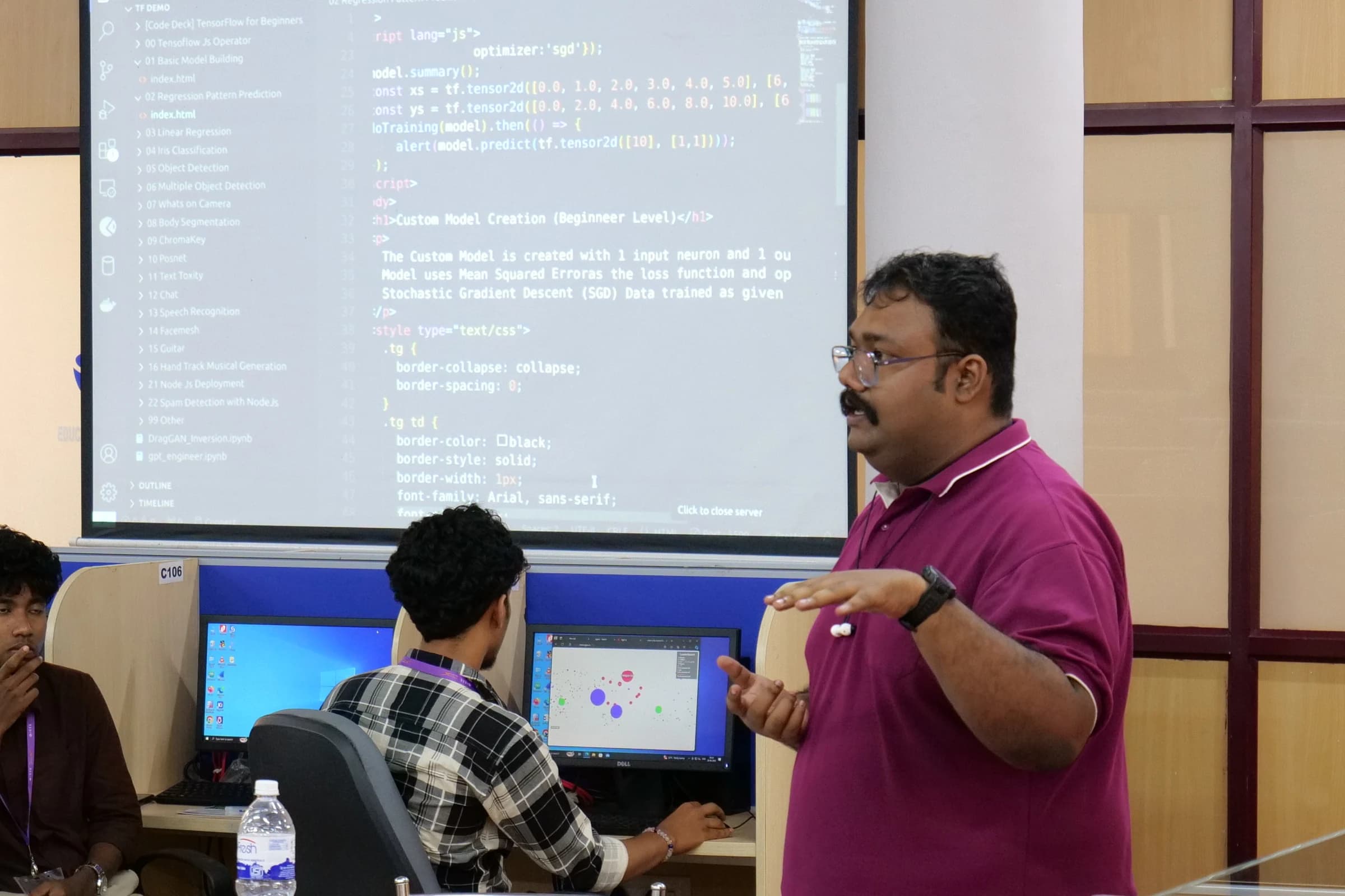 Instructor explaining code at the TechX Infinia opimaML workshop