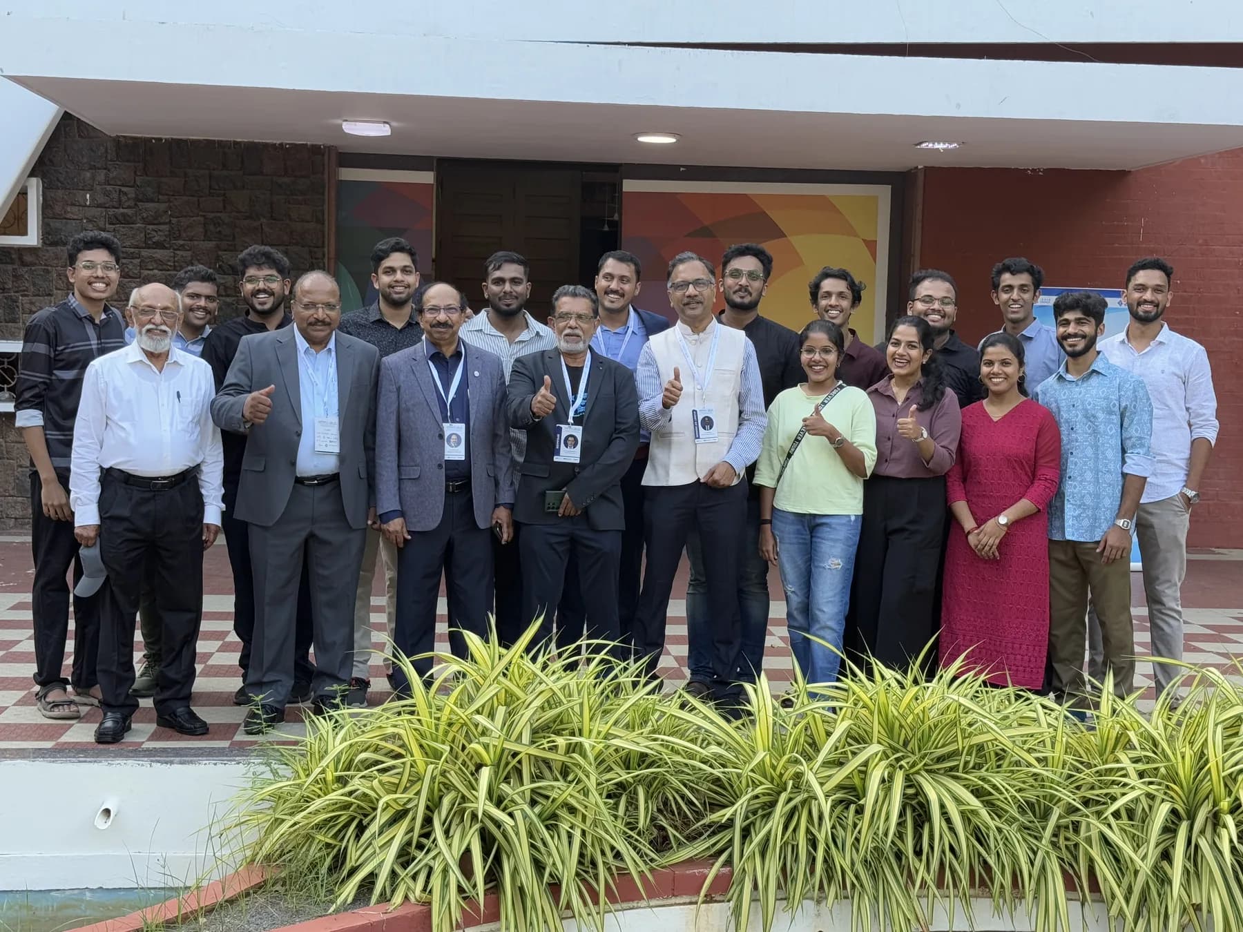 Robin Francis in a group photo after a partner meeting