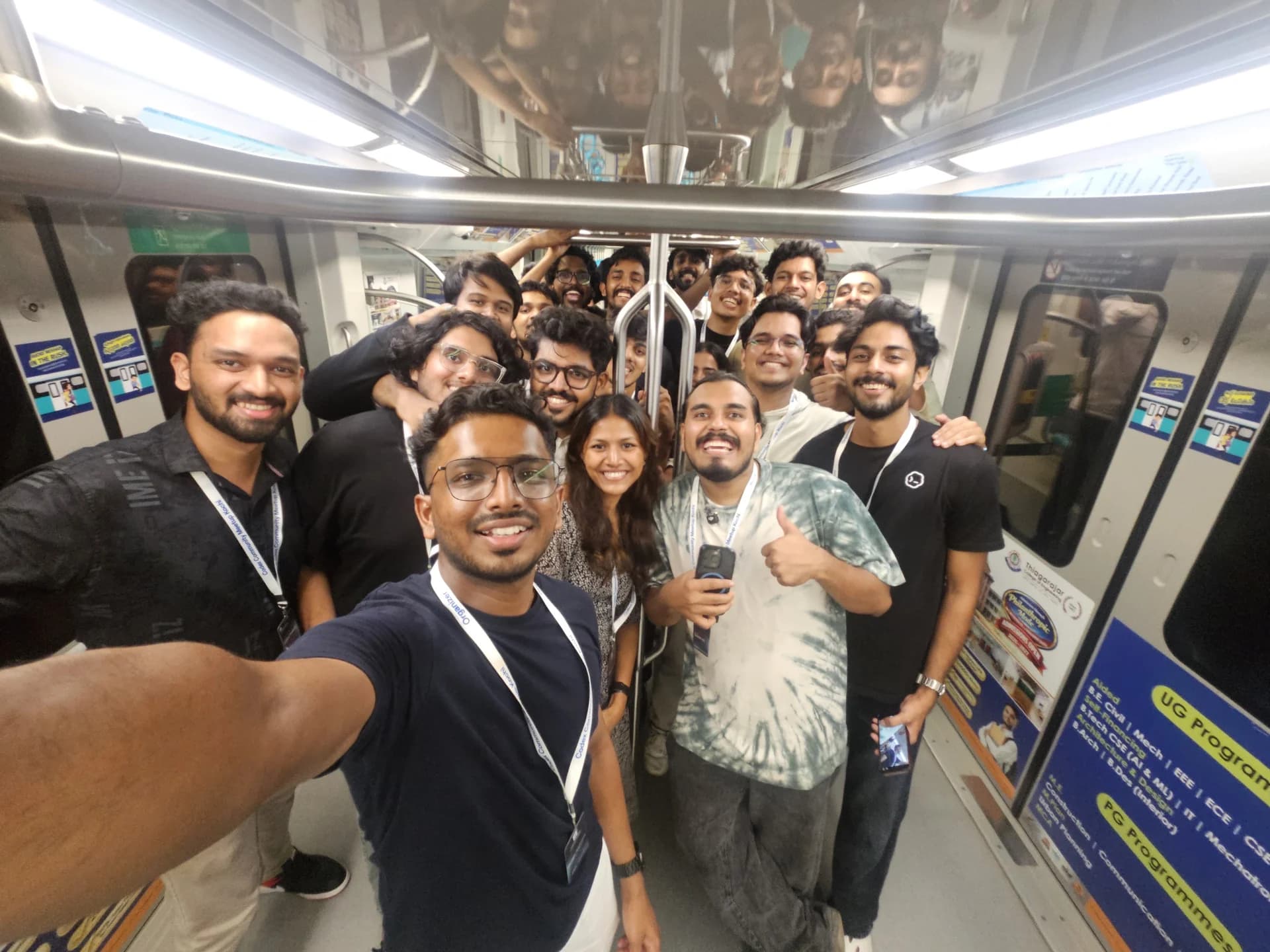 Builders coding inside a moving Kochi Metro train during Codex Nightline 2026