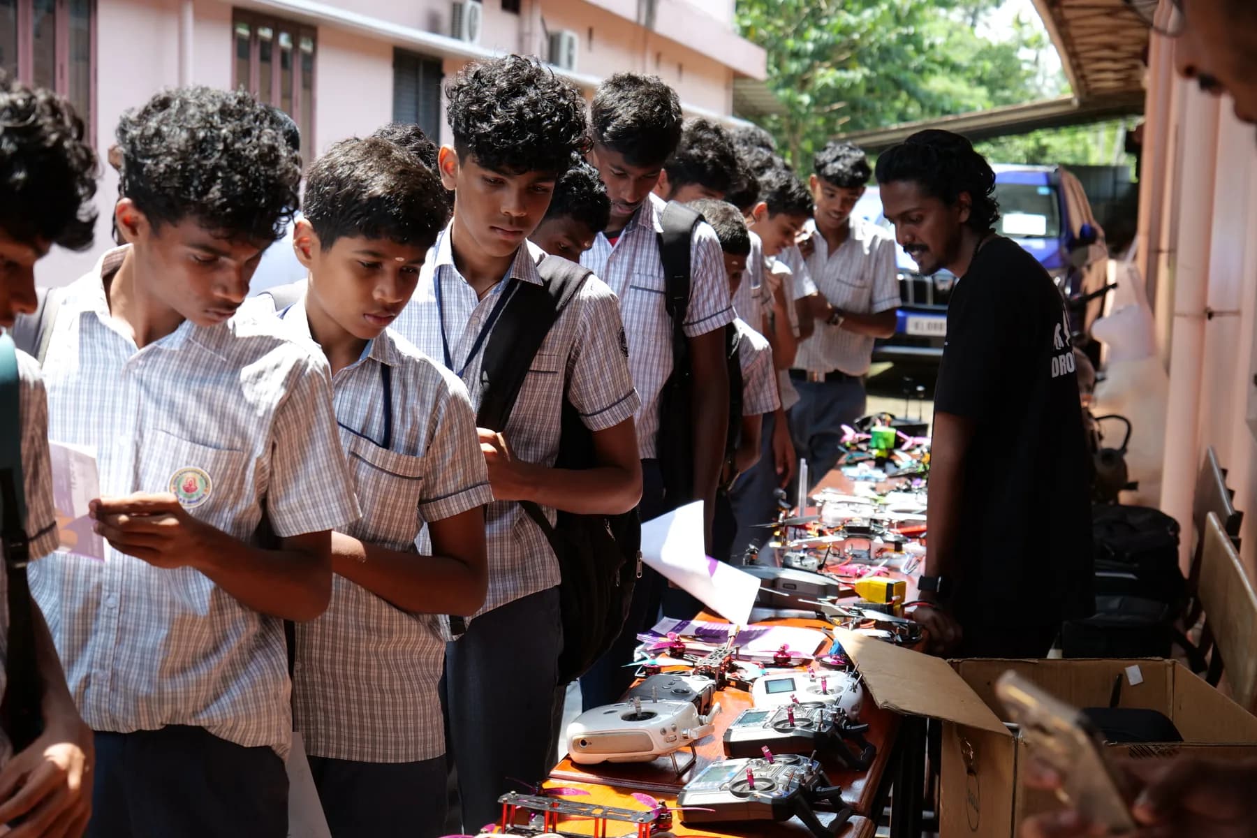 Students exploring drone technology during an IEEE Sahrdaya outreach session