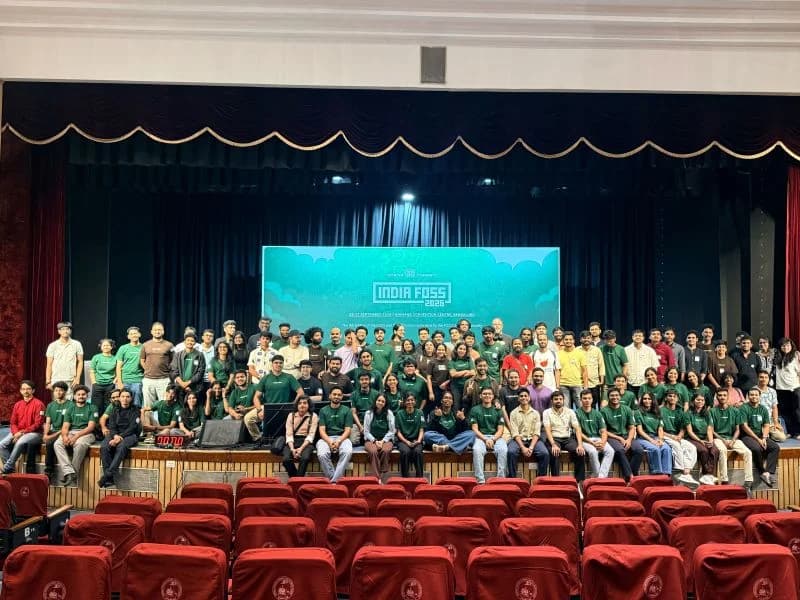 Volunteers and community members gathered on stage at IndiaFOSS 2026